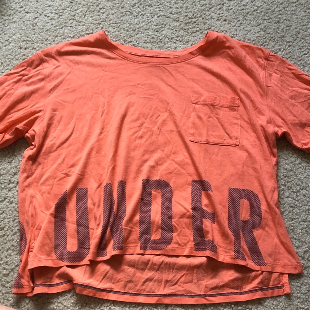 Light pink/orange youth cropped t-shirt